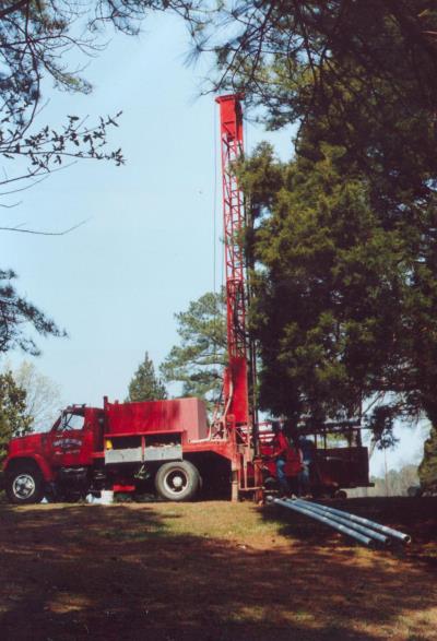 Drill truck set up amongst the trees